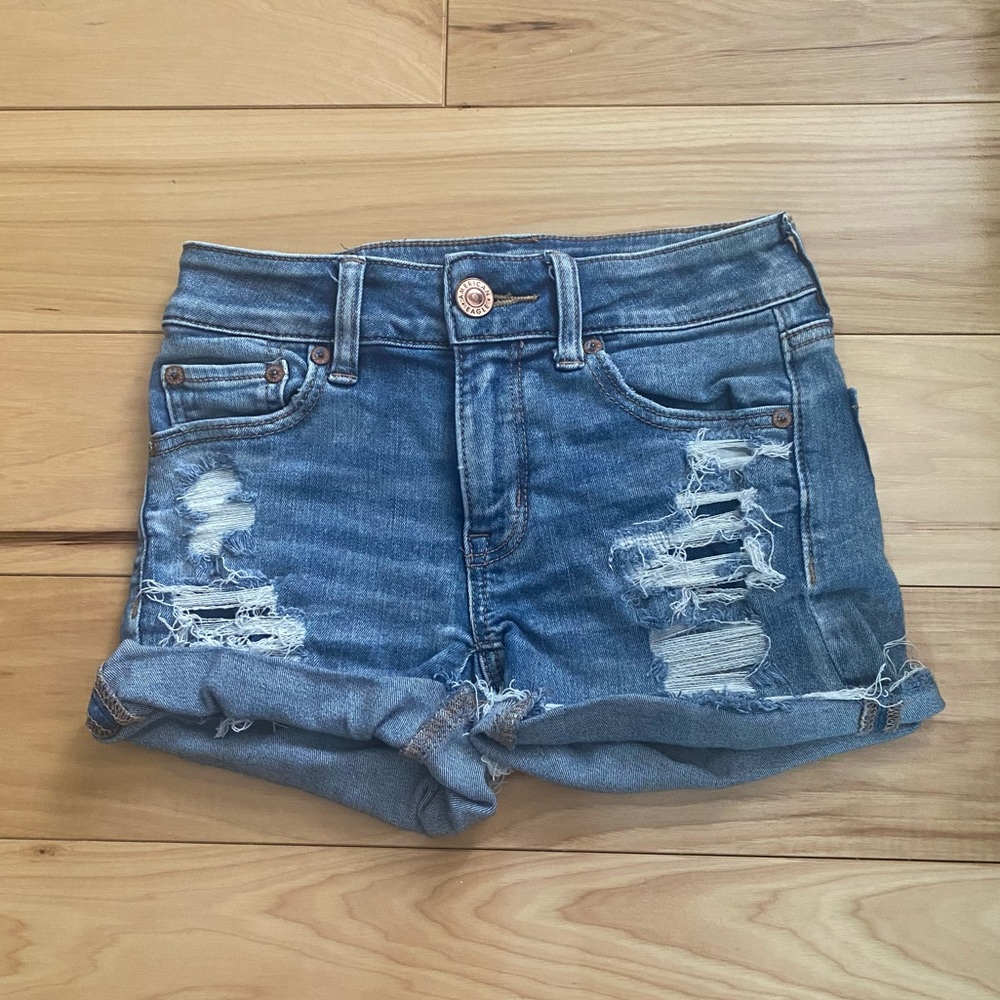 American Eagle distressed Midi Next Level Stretch jean shorts size 00.